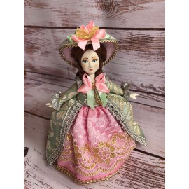 Handmade Porcelain doll, girl in a historical cost..